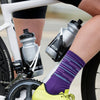 Bellwether cycling water bottles in specialized cage on specialized road bike