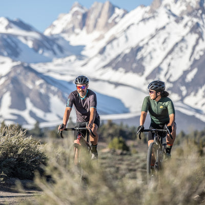 Man and womens riding gravle in California Sierras 
