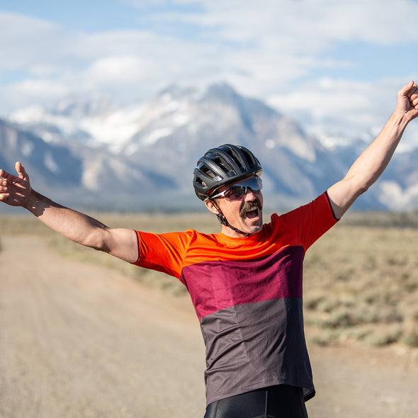 Joyous gravel cyclist wearing overland jersey 