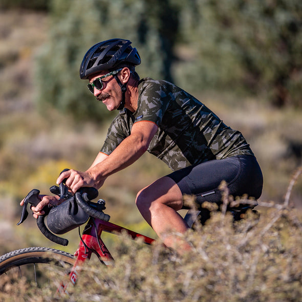 Gravel cyclist wearing Green jersey in California Sierra's 